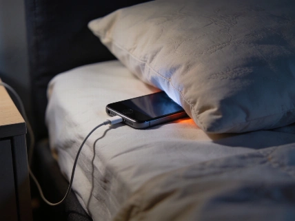 Charging your phone under a pillow risks overnight battery fires Nerds Magazine