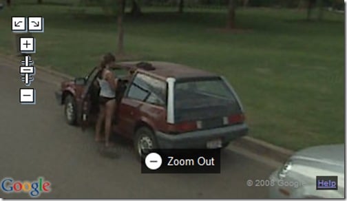 Girl changing clothes by the car