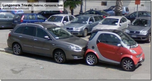 smartcar getting smooched by a hatchback