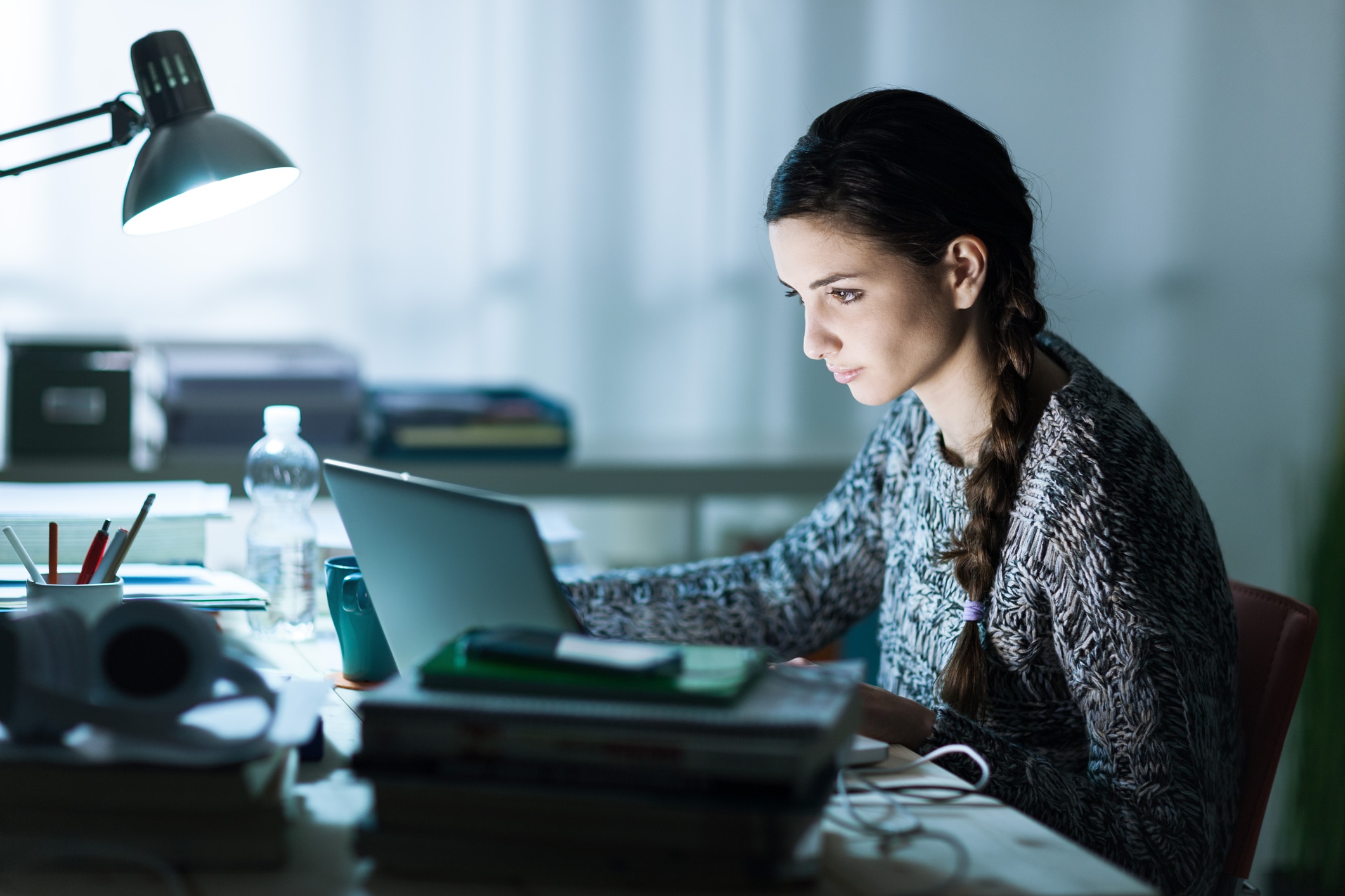 woman working at laptop in office