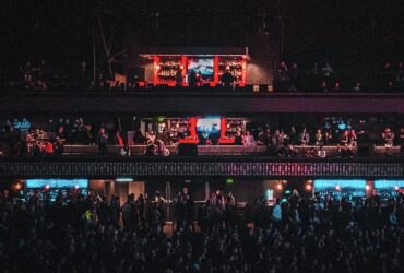 Crowd watching screens