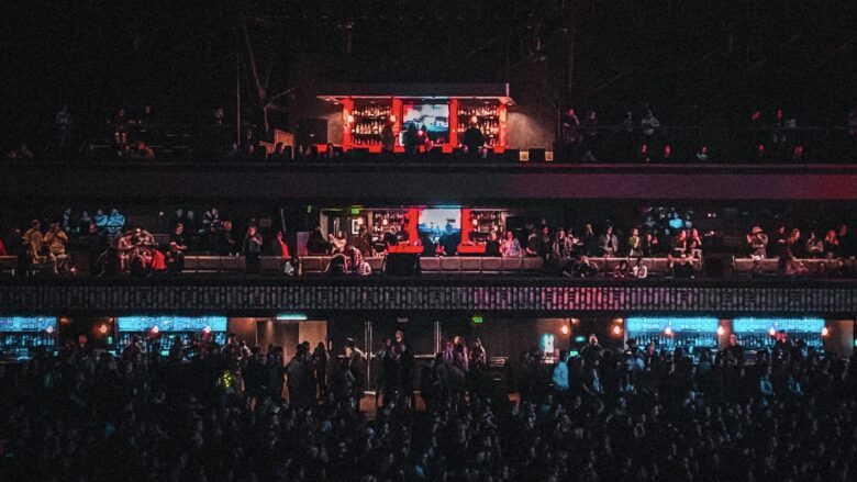 Crowd watching screens