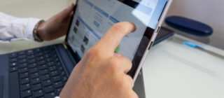 businessman working on laptop closeup shot