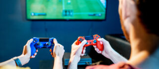 couple playing game on console