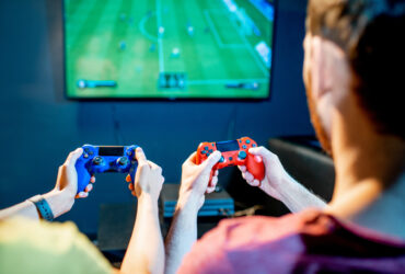 couple playing game on console