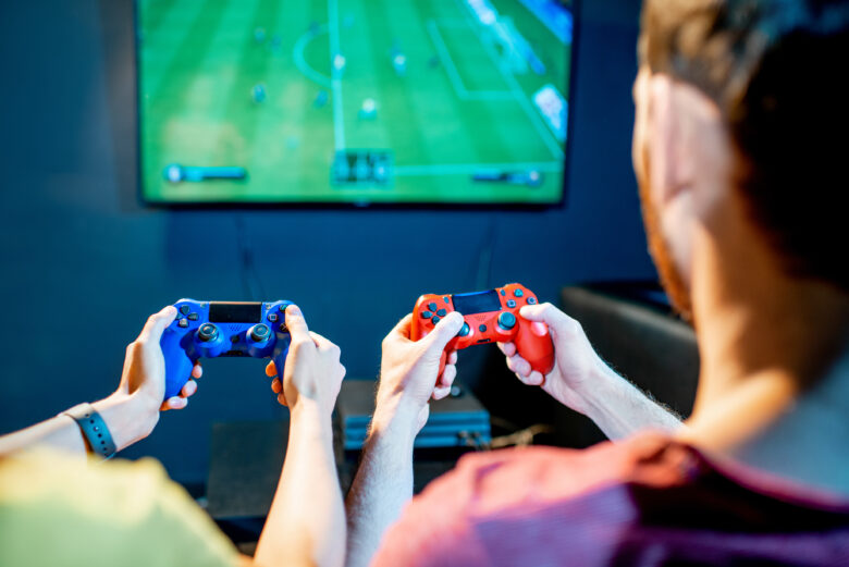 couple playing game on console