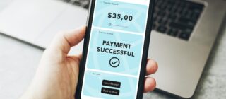 man paying with online retail payment portal