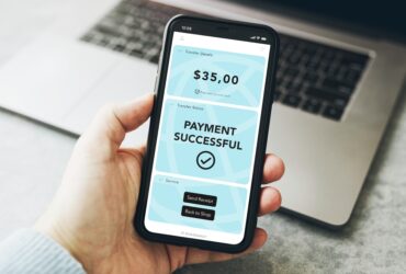 man paying with online retail payment portal