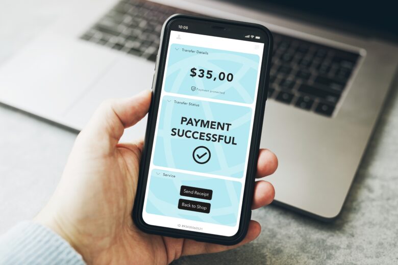 man paying with online retail payment portal
