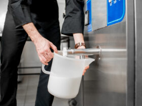 milk cooler pouring milk into jug