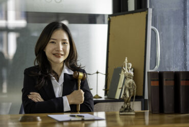young female lawyer holding gavel