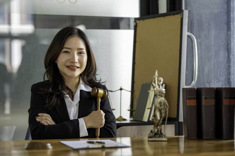 young female lawyer holding gavel