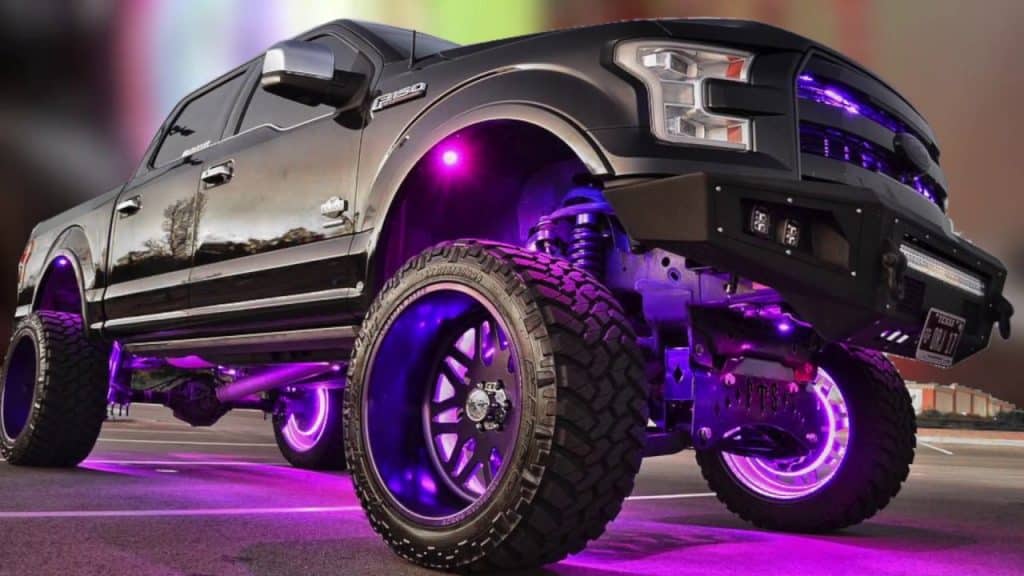 Ford F150 decked out with wheel and undercarriage lights