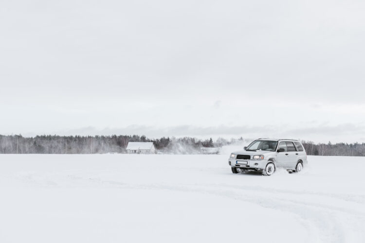 White range rover in snow