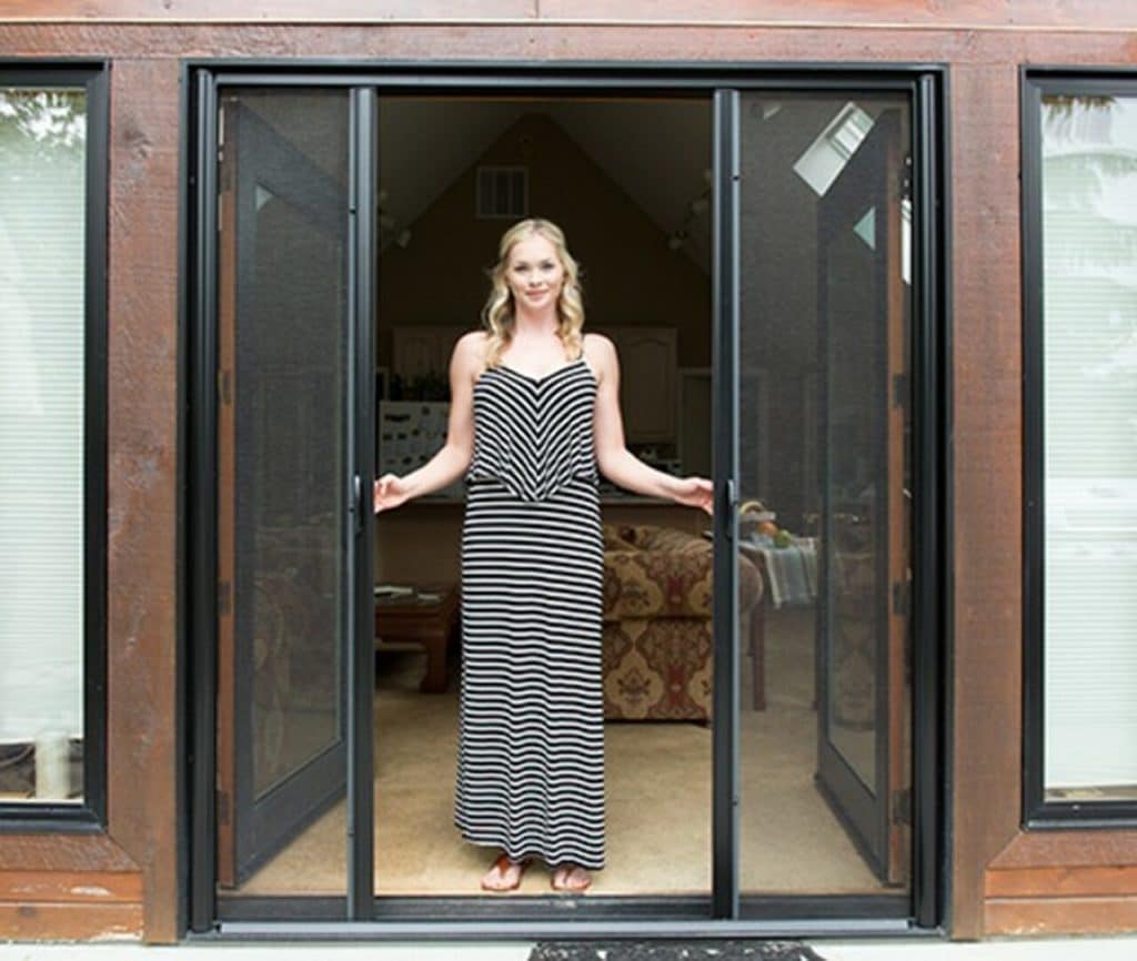 woman opening sliding doors