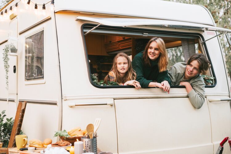 family on holiday in camper