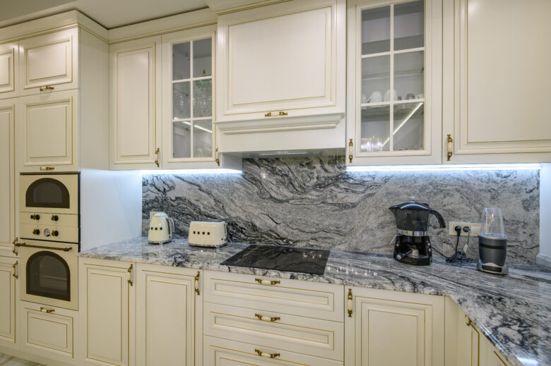 kitchen cream colored with backsplash