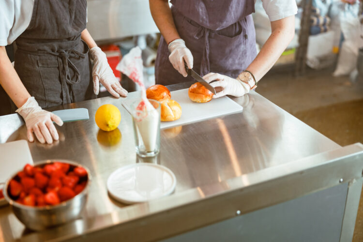 employees cutting food