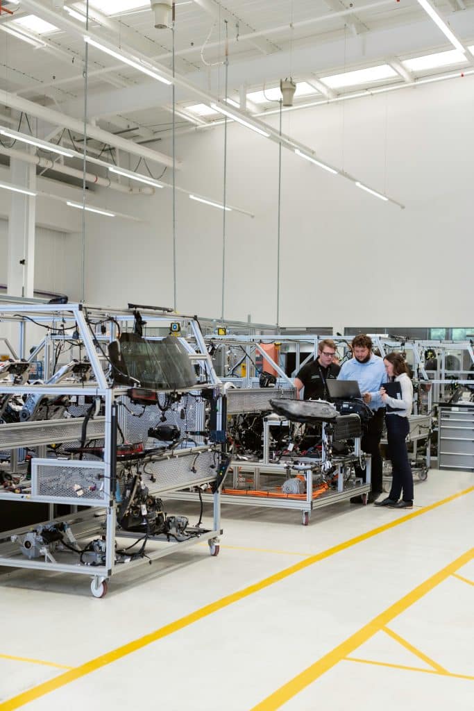 engineers working in a manufacturing area