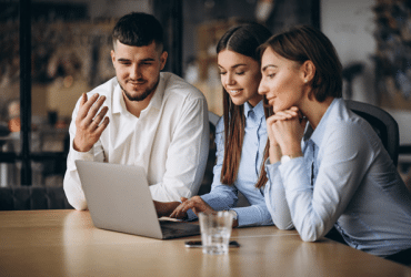 working group in front of laptop