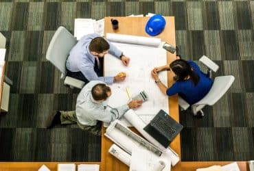 construction planning team at table