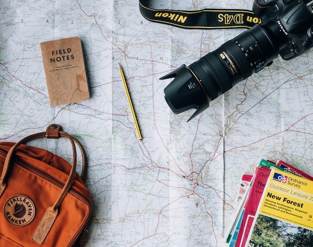 travel map with camera and guides on top