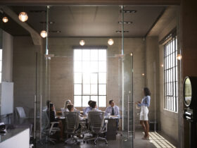 group in glass conference room