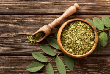 crushed green leaves for tea in a bowl