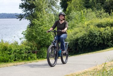 woman riding a bicycle in a park