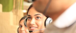 woman with a headset providing support services