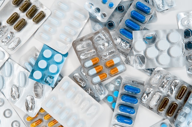 an assortment of pills in foil pill packs