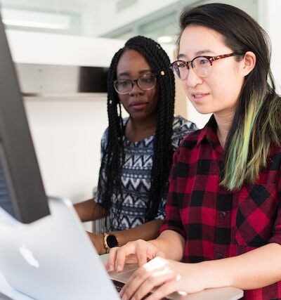 two girls on computer