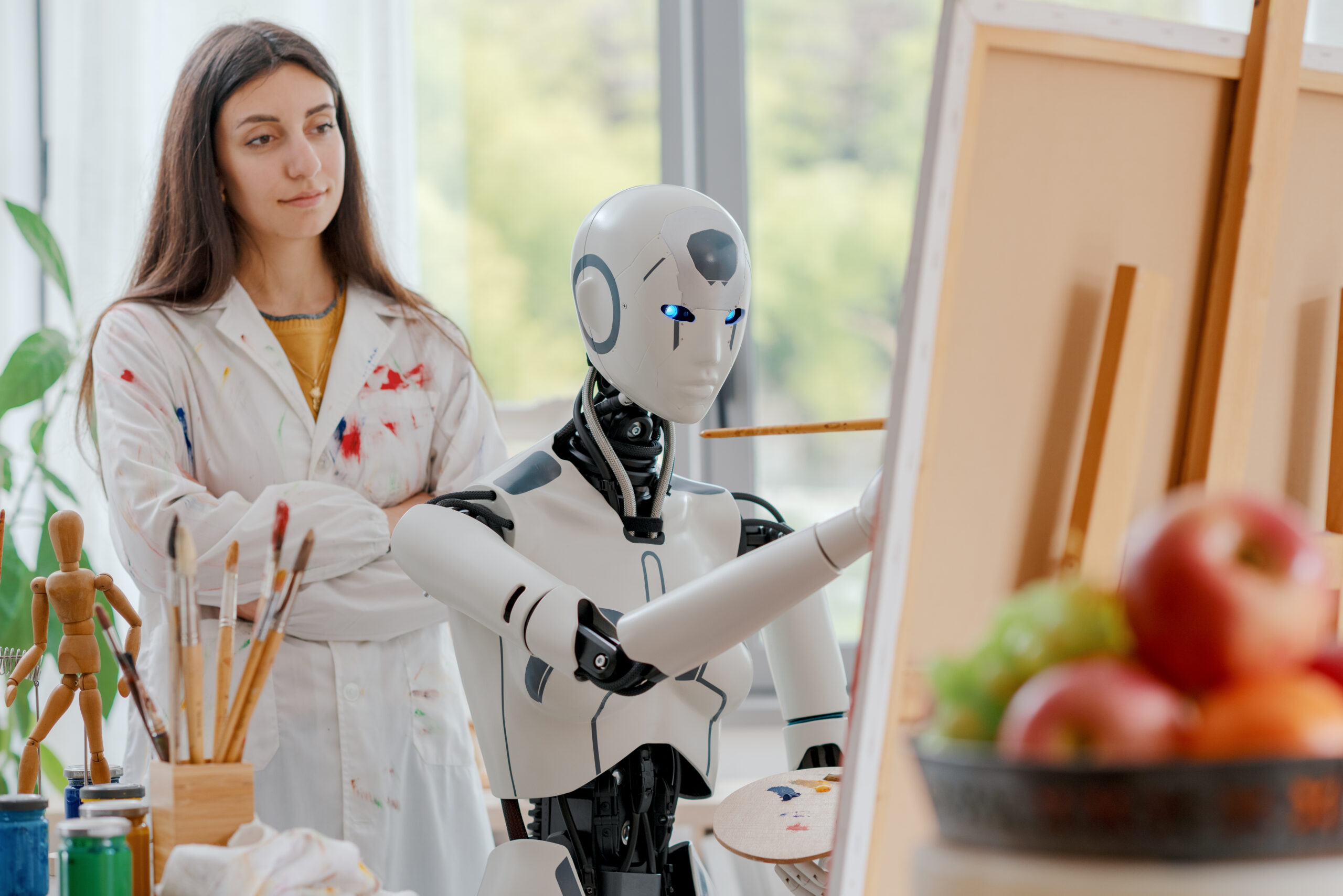 woman watching ai robot learn to paint