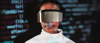 Female programmer wearing smart glasses