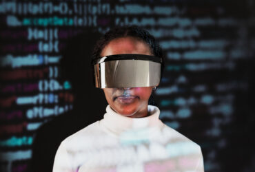 Female programmer wearing smart glasses