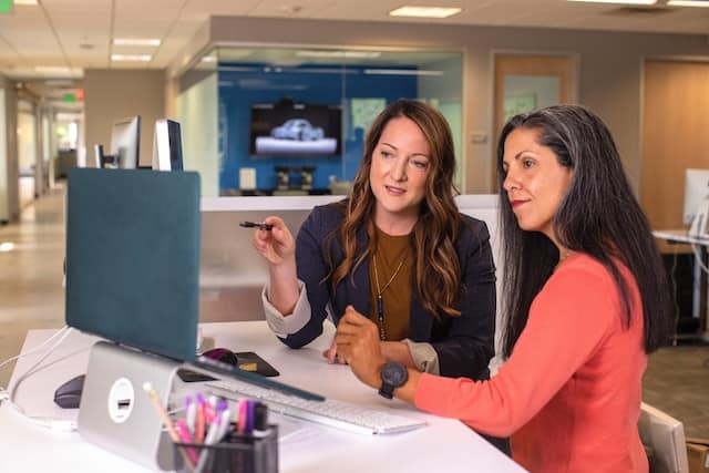 two women at a computer