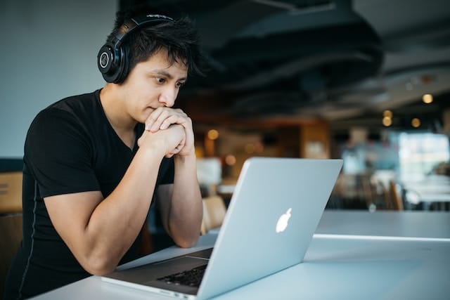 man learning on laptop