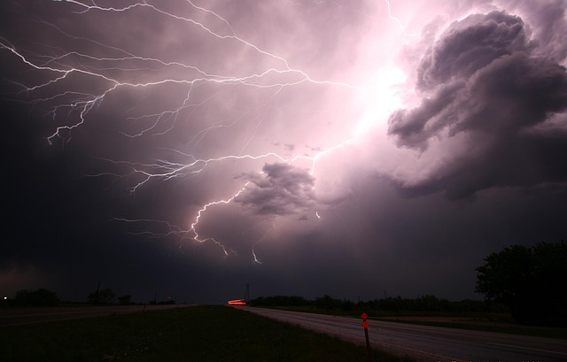 thunderstorm and rain on road