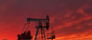 oil and gas rig at sunset