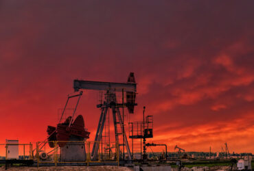 oil and gas rig at sunset