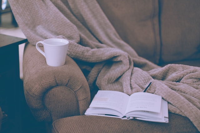 cozy blankets and book