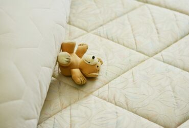 mattress and teddybear