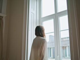 indoor air quality woman at window