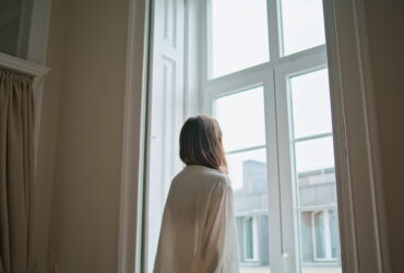 indoor air quality woman at window