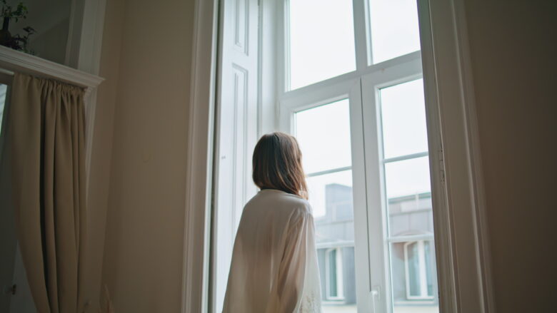 indoor air quality woman at window