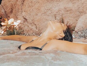 woman in hot tub spa water