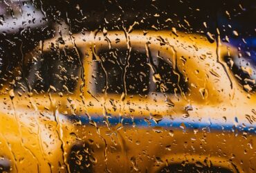 taxi driver rain city car raindrops window
