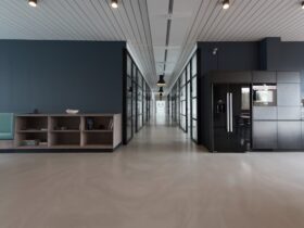 A large, open break room area in a modern office building