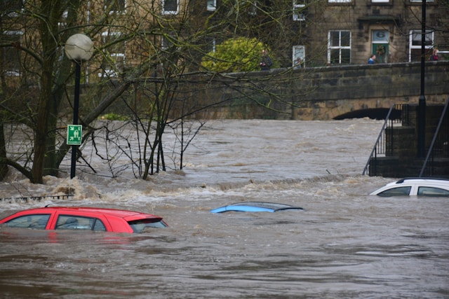 cars submerged in flood waters.