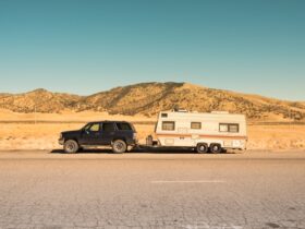 SUV pulling a camper trailer.